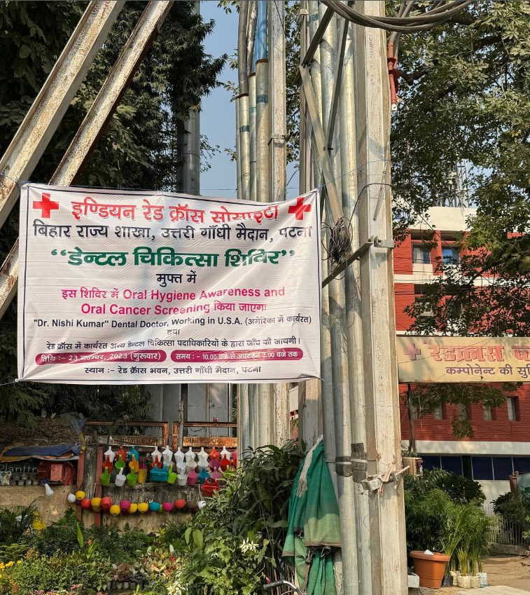 Banner announcing the free dental check-up camp outside Red Cross Bhawan
